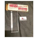 Grain bin and soil thermometer