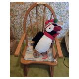 Wooden kids rocking chair and penguin
