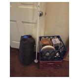 Milk crate with sleeping bag, and assorted items