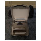 Vintage typewriter and bag