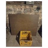 Metal folding table,  milkcrate, fishing poles