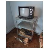 Vintage metal cart with tv and accessories