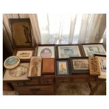 Assorted pictures and book storage