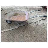 Vintage metal childrenï¿½s wheel barrow