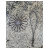 Rug beater and flower decor