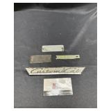 Vintage metal implement badges
