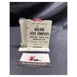 Metal Malone Seed Company rain gauge