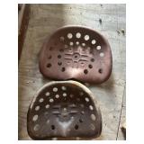 Steel implement seats