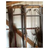 Hay hooks, saws, farm primitives
