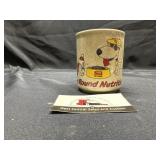 Kent feeds mug