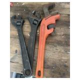 Adjustable wrenches