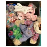 Tote of stuffed toys and beanies
