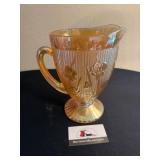 Marigold carnival glass pitcher