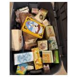 Large tote of Avon collectible bottles still in