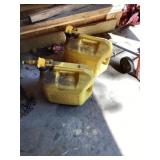 Two diesel fuel cans