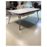 Chrome table with leaves approximately 41 1/2 x
