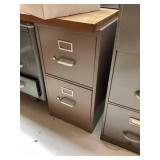 Metal file cabinet bring help to remove from the