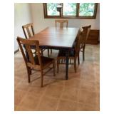 Dining room table with leaf and five oak chairs