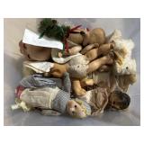 Tote of vintage dolls
