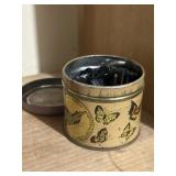 Small tin of vintage buttons