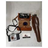 Vintage cameras and tripod
