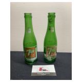 Two Vintage 7 up bottles