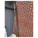 Approximately 8 foot garden ladder