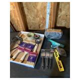 Paint brushes and welding  goggles