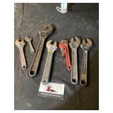 Adjustable wrenches