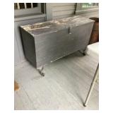 Box on wheels approximately 14 x 44 x 25 tall