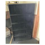 Wooden bookcase approximately 25 x 5 x 48 tall
