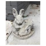 Concrete rabbits approximately 12 inches tall