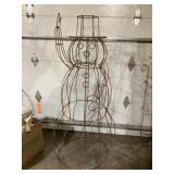 Metal snowman approximately 5 feet tall