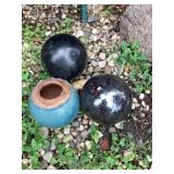 Gazing balls, one plastic