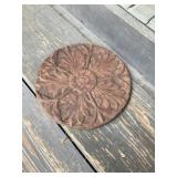 Cast-iron disc approximately 12 inches across