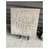 Love lives here plaque