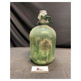 Green glass soda bottle