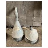 Two galvanized funnels