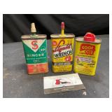 Singer, liquid wrench and misc cans