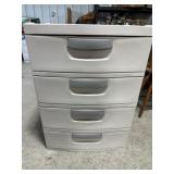 Plastic organizer full of crafting supplies