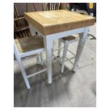 Small butcher block top table with chairs