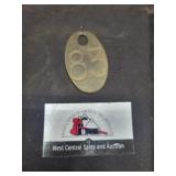 Vintage metal cattle tag