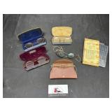 Vintage eye glasses and adding machine