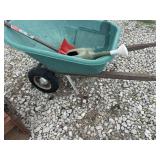 Wheel barrow, shovel, watering can