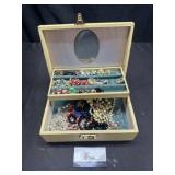 Vintage jewelry box with costume jewelry