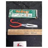 Fish gripper in original box