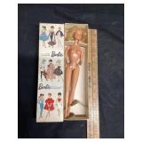Barbie and original box