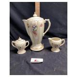 Porcelain coffee, pot, cream, and sugar
