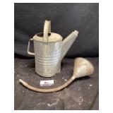 Galvanized watering can with funnel
