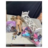 Doll with bed and clothes